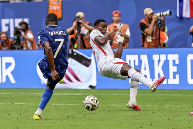 MIAMI GARDENS, FL - JULY 18: Ousmane Dembele 7 of France and Marc Guehi 6 of England battle for a ball during a FIFA World Cup, WM, Weltmeisterschaft, Fussball 26 Bronze Final match between France and England on July 18,2026 at Miami Stadium, in Miami Gardens, Fla.(Photo by Chris Arjoon Icon Sportswire) SOCCER: JUL 18 FIFA World Cup 26 Bronze Final - France v England EDITORIAL USE ONLY Icon26071800000030