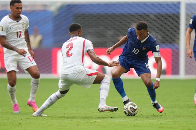 MIAMI GARDENS, FL - JULY 18: France forward Kylian MbappÃ (10) attacks with the ball as England defender Ezri Konsa (2) defends in the first half during the FIFA World Cup, WM, Weltmeisterschaft, Fussball 26 Bronze Final between France and England on Saturday, July 18, 2206 at Miami Stadium in Miami Gardens, FL (Photo by Peter Joneleit Icon Sportswire) SOCCER: JUL 18 FIFA World Cup 26 Bronze Final - France v England EDITORIAL USE ONLY Icon260718070