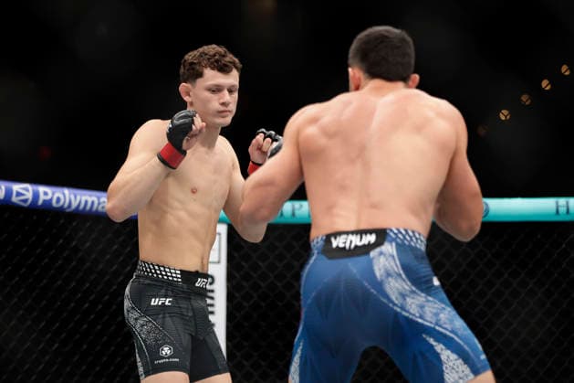 July 18, 2026, Oklahoma City, Oklahoma, United States: CHASE HOOPER and MITCH RAMIREZ fight in their 3-round Lightweight bout at UFC Fight Night OKC at the Paycom Center in Oklahoma City, OK. UFC Fight Night Oklahoma City  - ZUMAs346 20260718_zsp_s346_014 Copyright: xAlejandroxSalazarx