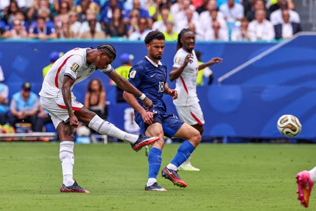 MIAMI GARDENS, FL - JULY 18: Marcus Rashford 11 of England shoots on goal as Warren Zaire-Emery 18 of France looks on during a FIFA World Cup, WM, Weltmeisterschaft, Fussball 26 Bronze Final match between France and England on July 18,2026 at Miami Stadium, in Miami Gardens, Fla.(Photo by Chris Arjoon Icon Sportswire) SOCCER: JUL 18 FIFA World Cup 26 Bronze Final - France v England EDITORIAL USE ONLY Icon26071800000063