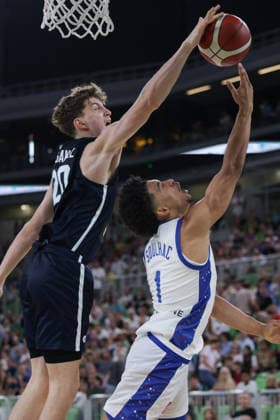 (260719) -- LJUBLJANA, July 19, 2026 -- Lovro Faganel (L) of Slovenia blocks the ball during the semifinal match between France and Slovenia at FIBA U20 EuroBasket 2026 in Ljubljana, Slovenia, July 18, 2026. (Photo by Xinhua) (SP)SLOVENIA-LJUBLJANA-BASKETBALL-FIBA U20 EUROBASKET-FRANCE VS SLOVENIA ZeljkoxStevanic 