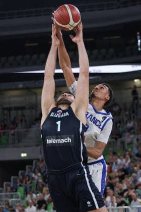 (260719) -- LJUBLJANA, July 19, 2026 -- Samed Grosic (front) of Slovenia vies with Oscar Wembanyama of France during the semifinal match between France and Slovenia at FIBA U20 EuroBasket 2026 in Ljubljana, Slovenia, July 18, 2026. (Photo by Xinhua) (SP)SLOVENIA-LJUBLJANA-BASKETBALL-FIBA U20 EUROBASKET-FRANCE VS SLOVENIA ZeljkoxStevanic 