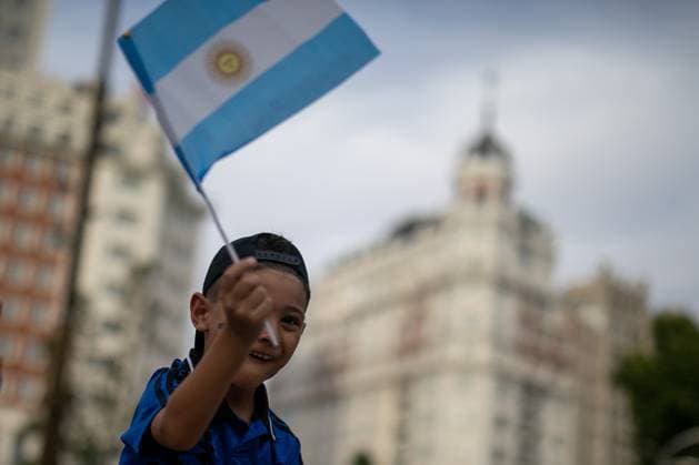 July 18, 2026, Madrid, Madrid, Spain: A child carries a small Argentine flag at a pre-match rally in Madrid.Argentine football fans gathered in Madrid s Plaza EspaoÂ±a to show their support for their team ahead of the 2026 FIFA World Cup, WM, Weltmeisterschaft, Fussball final against Spain in New York, USA. Argentine Fan Rally In Madrid  - ZUMAs197 0862030821st Copyright: xDavidxCanalesx