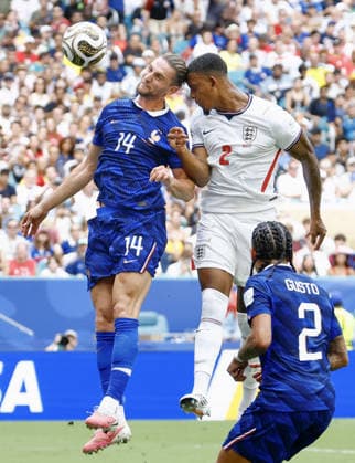 Football: 2026 World Cup England s Ezri Konsa (back, R) scores the team s second goal with a header in the first half of the World Cup third-place football match against France at Miami Stadium in Miami Gardens, Florida, on July 18, 2026.  A14AA0005623557P