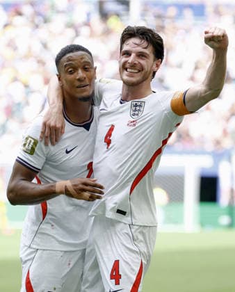 Football: 2026 World Cup England s Ezri Konsa (L) celebrates with Declan Rice after scoring the team s second goal in the first half of the World Cup third-place football match against France at Miami Stadium in Miami Gardens, Florida, on July 18, 2026.  A14AA0005623558P