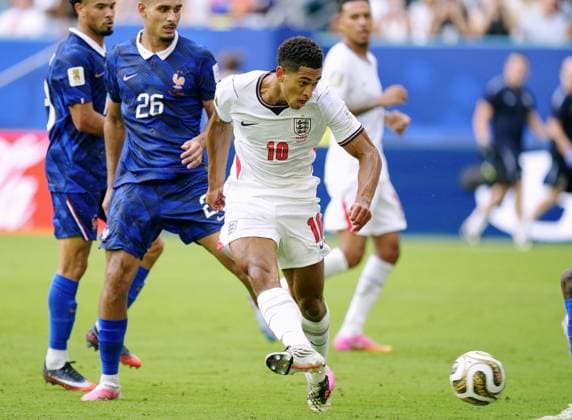 Football: 2026 World Cup England s Jude Bellingham (10) scores the team s sixth goal during second-half injury time in the World Cup third-place football match against France at Miami Stadium in Miami Gardens, Florida, on July 18, 2026.  A14AA0005623563P