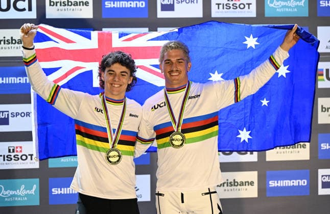 BMX WORLD CHAMPIONSHIPS, Under 23™s world champion Joshua Jolly (left) of Australia and Men™s Elite World Champion Jesse Asmus (right) of Australia celebrate winning with their gold medals during the BMX World Championships at Brisbane SX International BMX Centre in Brisbane, Sunday, July 19, 2026. ( NO ARCHIVING, EDITORIAL USE ONLY BRISBANE QUEENSLAND AUSTRALIA  Copyright: xDARRENxENGLANDx 20260719182254996751