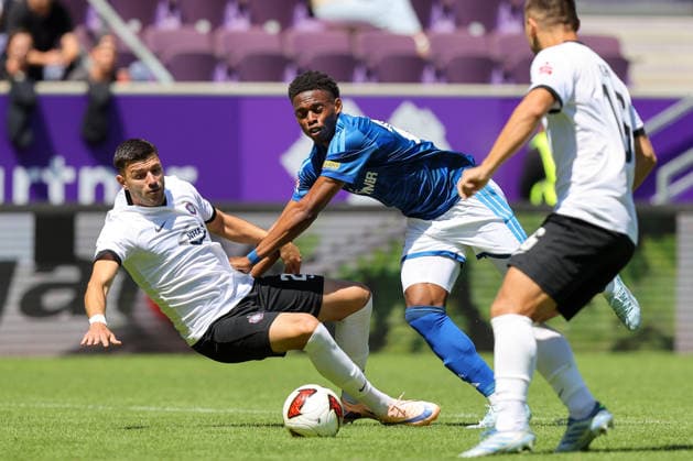 19.07.2026, xtgx, Fussball - Testspiel Erzgebirge Aue - FC Schalke 04 v.l. Stylianos Kokovas (Aue, 29), Junior Adamu (Schalke, 20) Zweikampf, Duell, Kampf, tackle (DFL DFB REGULATIONS PROHIBIT ANY USE OF PHOTOGRAPHS as IMAGE SEQUENCES and or QUASI-VIDEO) Aue *** July 19, 2026, xtgx, Soccer Friendly Match: Erzgebirge Aue vs. FC Schalke 04, by Stylianos Kokovas, Aue, 29, Junior Adamu (Schalke), 20, tackle, duel, battle, DFL and DFB regulations prohibit any use of photographs as image sequences and or quasi-video, Aue