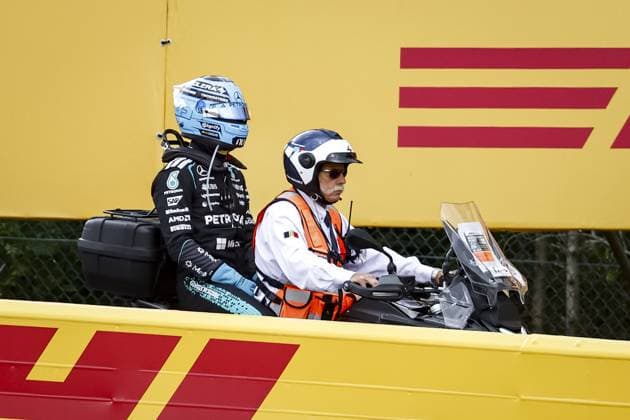 SPA - George Russell (Mercedes-AMG PETRONAS Formula One Team) returns to the paddock after his car ended up in the gravel trap during the Belgian Grand Prix race at the Spa-Francorchamps circuit. SEM VAN DER WAL ANP xVIxANPxSportx xxANPxIVx 563838973 originalFilename: 563838973.jpg