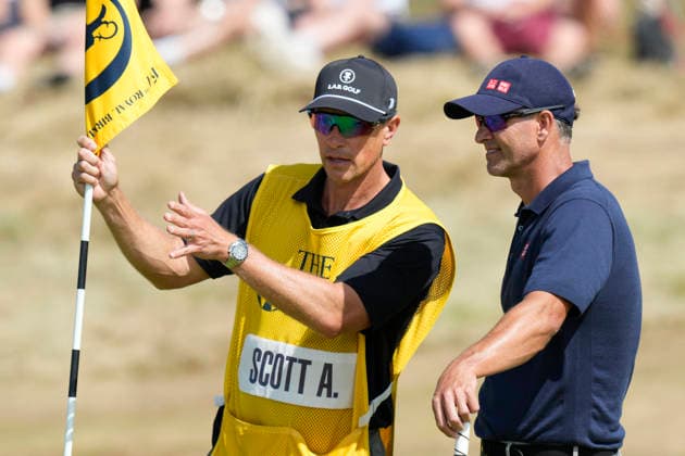 SOUTHPORT, ENGLAND - JULY 19: Adam Scott™s caddie gives him advice on the 3rd green during Round 4 of the 154th Open Championship at the Royal Birkdale Golf Club, Southport on July 19, 2026 in Merseyside, England The 154th British Open Championship
