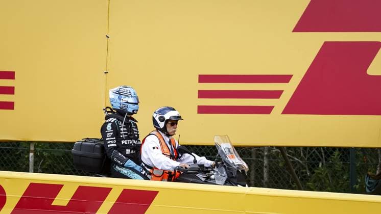 SPA - George Russell (Mercedes-AMG PETRONAS Formula One Team) returns to the paddock after his car ended up in the gravel trap during the Belgian Grand Prix race at the Spa-Francorchamps circuit. SEM VAN DER WAL ANP xVIxANPxSportx xxANPxIVx 563841399 originalFilename: 563841399.jpg