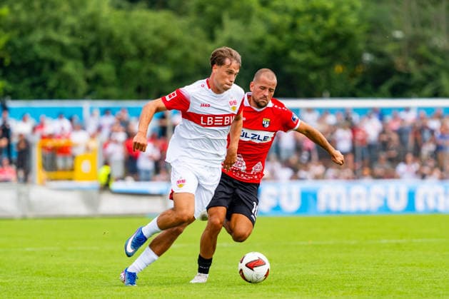 Testspiel: TSG Balingen vs. VfB Stuttgart; 19.07.2026 Balingen, GERMANY - 19. July 2027: Christopher Olivier (VfB Stuttgart, 31) im Zweikampf mit Ivo Colic (TSG Balingen, 10) während dem Testspiel zwischen der TSG Balingen und dem VfB Stuttgart in der BIZERBA ARENA, Balingen. *** Friendly Match: TSG Balingen vs. VfB Stuttgart, July 19, 2026, Balingen, GERMANY July 19, 2027 Christopher Olivier of VfB Stuttgart, No. 31, in a tackle with Ivo Colic of TSG Balingen, No. 10, during the friendly match between TSG Balingen and VfB Stuttgart at the BIZERBA ARENA in Balingen Copyright: xBEAUTIFULxSPORTS Steinx