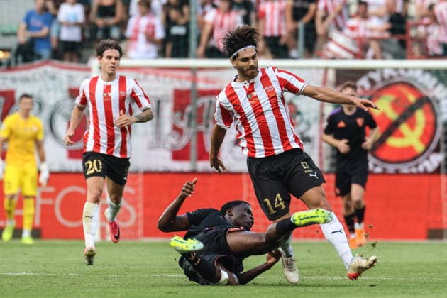 Krakow 19.07.2026. Pilka nozna Mecz jubileuszowy Cracovia - Sevilla FC --- Football friendly match Cracovia - Sevilla FC nz Lucien Agoume, Ajdin Hasic Fot. Konrad Swierad Arena Akcji NEWSPIX.PL --- newspix.pl 