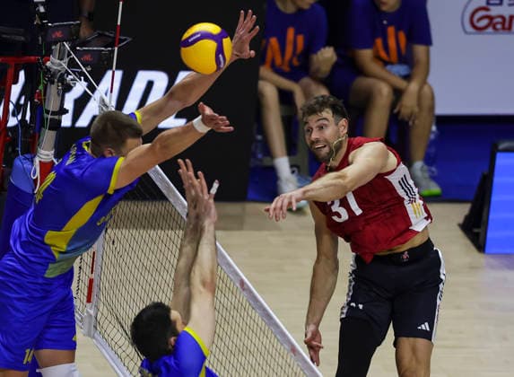 WomenÕs Volleyball Nations League - Belgrade 2026 Germany s Yann Bohme spikes the ball against Ukraine s Illa Kovalov during the MenÕs Volleyball Nations League Pool 7 match between Germany and Ukraine at Belgrade Arena on July 19, 2026 in Belgrade, Serbia. Belgrade Serbia Copyright: xSrdjanxStevanovicx x