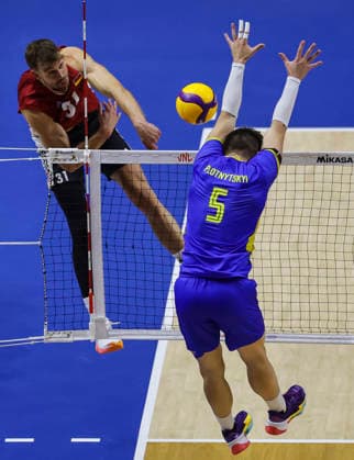 WomenÕs Volleyball Nations League - Belgrade 2026 Germany s Yann Bohme spikes the ball against Ukraine s Oleh Plotnytskyi during the MenÕs Volleyball Nations League Pool 7 match between Germany and Ukraine at Belgrade Arena on July 19, 2026 in Belgrade, Serbia. Belgrade Serbia Copyright: xSrdjanxStevanovicx x