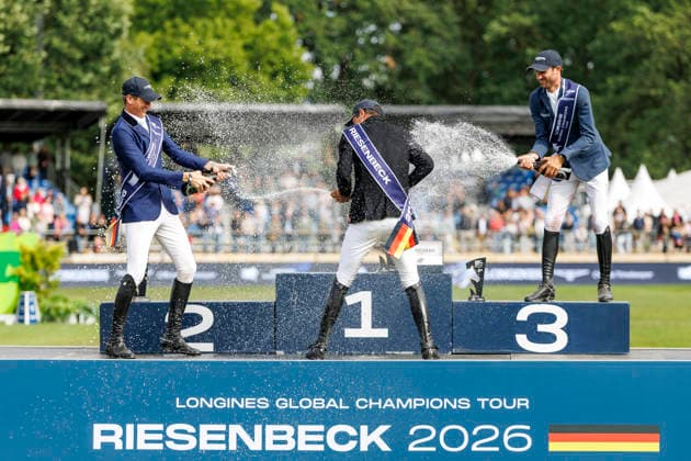 RIESENBECK - Longines Global Champions Tour of Riesenbeck 2026, RIESENBECK - Longines Global Champions Tour of Riesenbeck 2026 BETTENDORF Victor (LUX), DEUSSER Daniel (GER), KUKUK Christian (GER) Sektdusche Podest Siegerehrung Prize giving ceremony Longines GCT Grand Prix of Riesenbeck CSI5* - Int. jumping competition against the clock with jump-off (1.60 m) Riesenbeck, Riesenbeck International 19. July 2026 - *** RIESENBECK Longines Global Champions Tour of Riesenbeck 2026, RIESENBECK Longines Global Champions Tour of Riesenbeck 2026 BETTENDORF Victor LUX, DEUSSER Daniel GER, KUKUK Christian GER Sparkling wine shower Podium Prize-giving ceremony Longines GCT Grand Prix of Riesenbeck CSI5* International jumping competition against the clock with a jump-off 1 60 m Riesenbeck, Riesenbeck International July 19, 2026