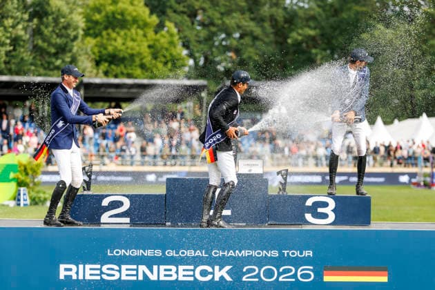 RIESENBECK - Longines Global Champions Tour of Riesenbeck 2026, RIESENBECK - Longines Global Champions Tour of Riesenbeck 2026 BETTENDORF Victor (LUX), DEUSSER Daniel (GER), KUKUK Christian (GER) Sektdusche Podest Siegerehrung Prize giving ceremony Longines GCT Grand Prix of Riesenbeck CSI5* - Int. jumping competition against the clock with jump-off (1.60 m) Riesenbeck, Riesenbeck International 19. July 2026 - *** RIESENBECK Longines Global Champions Tour of Riesenbeck 2026, RIESENBECK Longines Global Champions Tour of Riesenbeck 2026 BETTENDORF Victor LUX, DEUSSER Daniel GER, KUKUK Christian GER Sparkling wine shower Podium Prize-giving ceremony Longines GCT Grand Prix of Riesenbeck CSI5* International jumping competition against the clock with a jump-off 1 60 m Riesenbeck, Riesenbeck International July 19, 2026