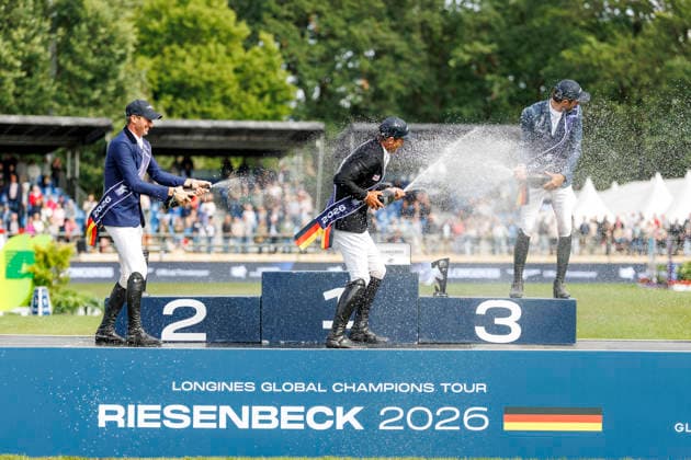 RIESENBECK - Longines Global Champions Tour of Riesenbeck 2026, RIESENBECK - Longines Global Champions Tour of Riesenbeck 2026 BETTENDORF Victor (LUX), DEUSSER Daniel (GER), KUKUK Christian (GER) Sektdusche Podest Siegerehrung Prize giving ceremony Longines GCT Grand Prix of Riesenbeck CSI5* - Int. jumping competition against the clock with jump-off (1.60 m) Riesenbeck, Riesenbeck International 19. July 2026 - *** RIESENBECK Longines Global Champions Tour of Riesenbeck 2026, RIESENBECK Longines Global Champions Tour of Riesenbeck 2026 BETTENDORF Victor LUX, DEUSSER Daniel GER, KUKUK Christian GER Sparkling wine shower Podium Prize-giving ceremony Longines GCT Grand Prix of Riesenbeck CSI5* International jumping competition against the clock with a jump-off 1 60 m Riesenbeck, Riesenbeck International July 19, 2026