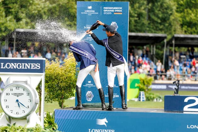 RIESENBECK - Longines Global Champions Tour of Riesenbeck 2026, RIESENBECK - Longines Global Champions Tour of Riesenbeck 2026 BETTENDORF Victor (LUX), DEUSSER Daniel (GER), KUKUK Christian (GER) Sektdusche Podest Siegerehrung Prize giving ceremony Longines GCT Grand Prix of Riesenbeck CSI5* - Int. jumping competition against the clock with jump-off (1.60 m) Riesenbeck, Riesenbeck International 19. July 2026 - *** RIESENBECK Longines Global Champions Tour of Riesenbeck 2026, RIESENBECK Longines Global Champions Tour of Riesenbeck 2026 BETTENDORF Victor LUX, DEUSSER Daniel GER, KUKUK Christian GER Sparkling wine shower Podium Prize-giving ceremony Longines GCT Grand Prix of Riesenbeck CSI5* International jumping competition against the clock with a jump-off 1 60 m Riesenbeck, Riesenbeck International July 19, 2026