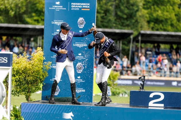 RIESENBECK - Longines Global Champions Tour of Riesenbeck 2026, RIESENBECK - Longines Global Champions Tour of Riesenbeck 2026 BETTENDORF Victor (LUX), DEUSSER Daniel (GER), KUKUK Christian (GER) Sektdusche Podest Siegerehrung Prize giving ceremony Longines GCT Grand Prix of Riesenbeck CSI5* - Int. jumping competition against the clock with jump-off (1.60 m) Riesenbeck, Riesenbeck International 19. July 2026 - *** RIESENBECK Longines Global Champions Tour of Riesenbeck 2026, RIESENBECK Longines Global Champions Tour of Riesenbeck 2026 BETTENDORF Victor LUX, DEUSSER Daniel GER, KUKUK Christian GER Sparkling wine shower Podium Prize-giving ceremony Longines GCT Grand Prix of Riesenbeck CSI5* International jumping competition against the clock with a jump-off 1 60 m Riesenbeck, Riesenbeck International July 19, 2026