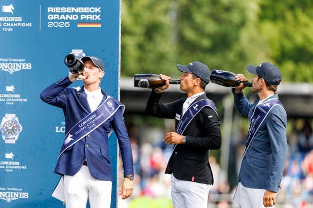 RIESENBECK - Longines Global Champions Tour of Riesenbeck 2026, RIESENBECK - Longines Global Champions Tour of Riesenbeck 2026 BETTENDORF Victor (LUX), DEUSSER Daniel (GER), KUKUK Christian (GER) Sektdusche Podest Siegerehrung Prize giving ceremony Longines GCT Grand Prix of Riesenbeck CSI5* - Int. jumping competition against the clock with jump-off (1.60 m) Riesenbeck, Riesenbeck International 19. July 2026 - *** RIESENBECK Longines Global Champions Tour of Riesenbeck 2026, RIESENBECK Longines Global Champions Tour of Riesenbeck 2026 BETTENDORF Victor LUX, DEUSSER Daniel GER, KUKUK Christian GER Sparkling wine shower Podium Prize-giving ceremony Longines GCT Grand Prix of Riesenbeck CSI5* International jumping competition against the clock with a jump-off 1 60 m Riesenbeck, Riesenbeck International July 19, 2026