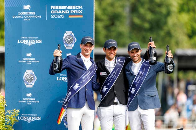 RIESENBECK - Longines Global Champions Tour of Riesenbeck 2026, RIESENBECK - Longines Global Champions Tour of Riesenbeck 2026 BETTENDORF Victor (LUX), DEUSSER Daniel (GER), KUKUK Christian (GER) Sektdusche Podest Siegerehrung Prize giving ceremony Longines GCT Grand Prix of Riesenbeck CSI5* - Int. jumping competition against the clock with jump-off (1.60 m) Riesenbeck, Riesenbeck International 19. July 2026 - *** RIESENBECK Longines Global Champions Tour of Riesenbeck 2026, RIESENBECK Longines Global Champions Tour of Riesenbeck 2026 BETTENDORF Victor LUX, DEUSSER Daniel GER, KUKUK Christian GER Sparkling wine shower Podium Prize-giving ceremony Longines GCT Grand Prix of Riesenbeck CSI5* International jumping competition against the clock with a jump-off 1 60 m Riesenbeck, Riesenbeck International July 19, 2026