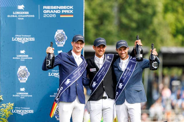 RIESENBECK - Longines Global Champions Tour of Riesenbeck 2026, RIESENBECK - Longines Global Champions Tour of Riesenbeck 2026 BETTENDORF Victor (LUX), DEUSSER Daniel (GER), KUKUK Christian (GER) Sektdusche Podest Siegerehrung Prize giving ceremony Longines GCT Grand Prix of Riesenbeck CSI5* - Int. jumping competition against the clock with jump-off (1.60 m) Riesenbeck, Riesenbeck International 19. July 2026 - *** RIESENBECK Longines Global Champions Tour of Riesenbeck 2026, RIESENBECK Longines Global Champions Tour of Riesenbeck 2026 BETTENDORF Victor LUX, DEUSSER Daniel GER, KUKUK Christian GER Sparkling wine shower Podium Prize-giving ceremony Longines GCT Grand Prix of Riesenbeck CSI5* International jumping competition against the clock with a jump-off 1 60 m Riesenbeck, Riesenbeck International July 19, 2026
