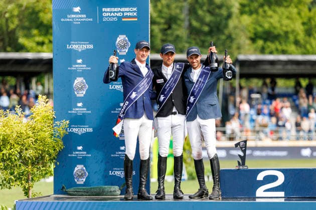 RIESENBECK - Longines Global Champions Tour of Riesenbeck 2026, RIESENBECK - Longines Global Champions Tour of Riesenbeck 2026 BETTENDORF Victor (LUX), DEUSSER Daniel (GER), KUKUK Christian (GER) Sektdusche Podest Siegerehrung Prize giving ceremony Longines GCT Grand Prix of Riesenbeck CSI5* - Int. jumping competition against the clock with jump-off (1.60 m) Riesenbeck, Riesenbeck International 19. July 2026 - *** RIESENBECK Longines Global Champions Tour of Riesenbeck 2026, RIESENBECK Longines Global Champions Tour of Riesenbeck 2026 BETTENDORF Victor LUX, DEUSSER Daniel GER, KUKUK Christian GER Sparkling wine shower Podium Prize-giving ceremony Longines GCT Grand Prix of Riesenbeck CSI5* International jumping competition against the clock with a jump-off 1 60 m Riesenbeck, Riesenbeck International July 19, 2026