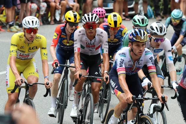 Tour de France 2026 - UCI Cycling Race Pierre Teyssot MAXPPP ; Tour de France 2026 - UCI Cycling Race. Plateau de Solaison, France on July 19, 2026. From left UAE Team Emirates - XRG s Slovenian rider Tadej Pogacar wearing the overall leader s yellow jersey, UAE Team Emirates. XRG s Mexican rider Isaac Del Toro, Decathlon CMA CGM Team s French rider Paul Seixas wearing the best young rider s white jersey (right) in action in a pursuing group in the ascent of the Plateau de Solaison during the 15th stage of the 113th edition of the Tour de France cycling race, 183,9 km between Champagnole and Plateau de Solaison, on July 19, 2026. Pierre Teyssot Maxppp Plateau de Solaison Haute-Savoie France  Copyright: xMAXPPPxPierrexTeyssotx TEY65332 TEY65332