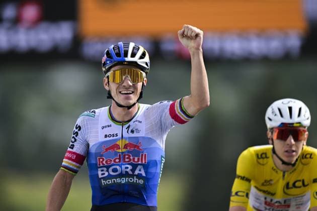Belgian Remco Evenepoel of Red Bull-BORA-hansgrohe celebrates as he wins ahead of Slovenian Tadej Pogacar of UAE Team Emirates XRG stage 15 of the 2026 Tour de France cycling race, a stage of 184km from Champagnole to Plateau de Solaison, on Sunday 19 July 2026. The 113th edition of the Tour de France starts on Saturday 4 July in Barcelona, Spain, and will finish in Paris, France on the 26th of July. DAVIDxPINTENS  x181485218x