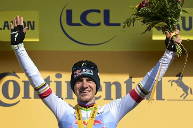 Belgian Remco Evenepoel of Red Bull-BORA-hansgrohe celebrates on the podium after winning stage 15 of the 2026 Tour de France cycling race, a stage of 184km from Champagnole to Plateau de Solaison, on Sunday 19 July 2026. The 113th edition of the Tour de France starts on Saturday 4 July in Barcelona, Spain, and will finish in Paris, France on the 26th of July. DAVIDxPINTENS  x181486174x