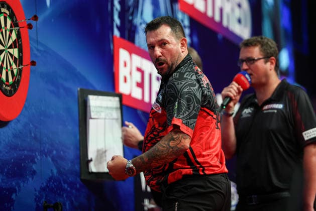 RECORD DATE NOT STATED 19th July 2026, Winter Gardens, Blackpool, Lancashire, England; 2026 Betfred World Matchplay Darts, Day Two; Jonny Clayton reacts after winning a leg in his match against Damon Heta AidanxHunter