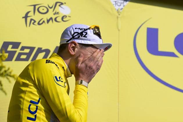 Slovenian Tadej Pogacar of UAE Team Emirates XRG pictured on the podium after stage 15 of the 2026 Tour de France cycling race, a stage of 184km from Champagnole to Plateau de Solaison, on Sunday 19 July 2026. The 113th edition of the Tour de France starts on Saturday 4 July in Barcelona, Spain, and will finish in Paris, France on the 26th of July. DAVIDxPINTENS  x181487278x