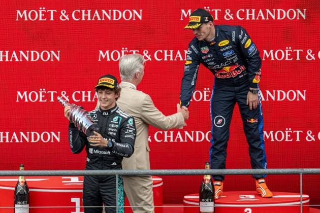 Mercedes Italian rider Kimi Antonelli, King Philippe - Filip of Belgium and Red Bull Racing Dutch rider Max Verstappen pictured on the podium after the Grand Prix F1 of Belgium race, in Spa-Francorchamps, Sunday 19 July 2026. The Spa-Francorchamps Formula One Grand Prix takes place this weekend, from July 17th to July 19th. JONASxROOSENS  x181491669x