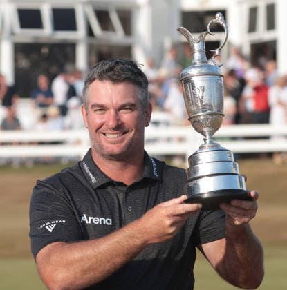 New Zealand s Ryan Fox holds the Claret jug after victory at the 154th Open Championship at Royal Birkdale in Southport, on Sunday, July 19, 2026. Cox won the tournament with a score of ten under par.  LON2026071903 HUGOxPHILPOTT