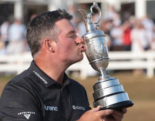 New Zealand s Ryan Fox holds the Claret jug after victory at the 154th Open Championship at Royal Birkdale in Southport, on Sunday, July 19, 2026. Cox won the tournament with a score of ten under par.  LON2026071904 HUGOxPHILPOTT