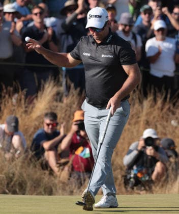 New Zealand s Ryan Fox reacts after a birdie on the 15th hole at the 154th Open Championship at Royal Birkdale in Southport, on Sunday, July 19, 2026. Cox won the tournament with a score of ten under par.  LON2026071929 HUGOxPHILPOTT