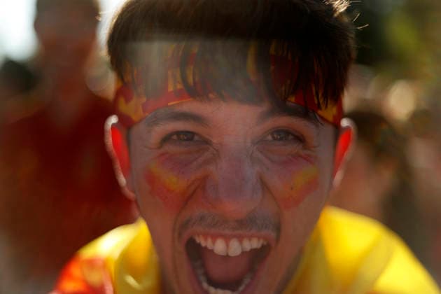 July 19, 2026, Madrid, Madrid, Spain: Thousands of Spanish soccer fans gather at the Puente del Rey esplanade to watch the highly anticipated 2026 World Cup Final match being played between Spain and Argentina on a giant screen installed by the Madrid City Council. The enthusiastic supporters braved the intense summer heat of the capital, arriving with hats, their faces painted in the national colors, and waving flags to passionately cheer for the Spanish national team, Nationalteam As the historic championship clash between the European and South American powerhouses unfolded, the atmosphere in the Madrid Rio park transformed into a tense and vibrant sea of red and yellow. The devoted crowd experienced every crucial play, foul, and shot on goal with overwhelming collective emotion and anxiety, dreaming of lifting the coveted trophy. Madrid Spain - ZUMAo127 20260719_zep_o127_007 Copyright: xHugoxOrtunox