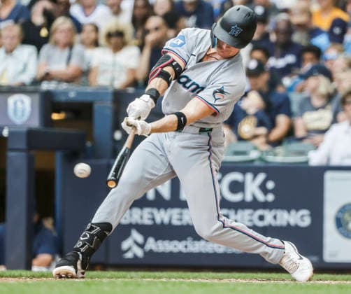 Miami Marlins designated hitter Griffin Conine hits a single in the fifth inning of the MLB, Baseball Herren, USA game between the Miami Marlins and the Milwaukee Brewers at American Family Field in Milwaukee, Wisconsin on Sunday July 19, 2026.  MIL20260719812 TANNENxMAURY
