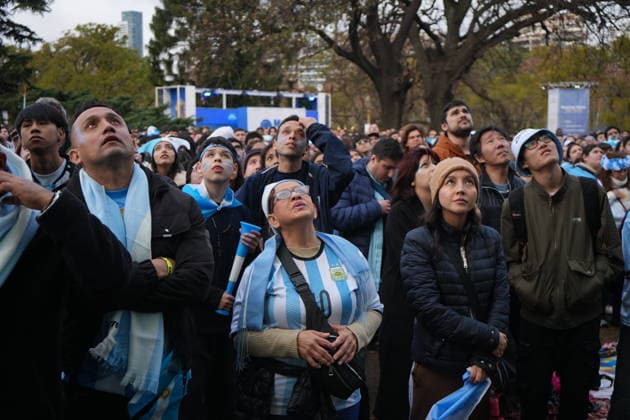 Thousands gather in Buenos Aires to watch FIFA World Cup, WM, Weltmeisterschaft, Fussball Final BUENOS AIRES, ARGENTINA - JULY 19: Argentine football fans wearing national team, Nationalteam jerseys and waving flags watch the live broadcast of the FIFA World Cup final match between Argentina and Spain on a giant screen in Buenos Aires, Argentina on July 19, 2026. Thousands of supporters gathered in public squares, bars, and fan zones across the national capital to cheer for their team in the highly anticipated championship clash. Luciano Gonzalez Anadolu Buenos Aires Argentina. Editorial use only. Please get in touch for any other usage.  Copyright: x2026xAnadoluxLucianoxGonzalezx