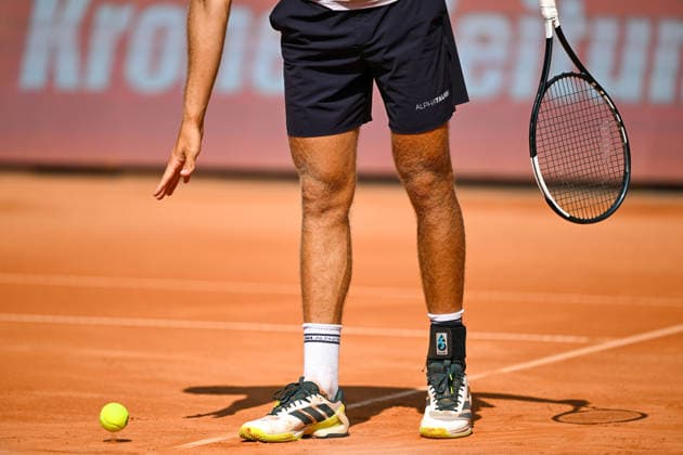 TENNIS - ATP, Tennis Herren Generali Open 2026 KITZBUEHEL,AUSTRIA,20.JUL.26 - TENNIS - ATP World Tour, Generali Open. Image shows a feature with a ball, a hand, two feet and a racket.  GEPAxpictures xDanielxSchoenherr