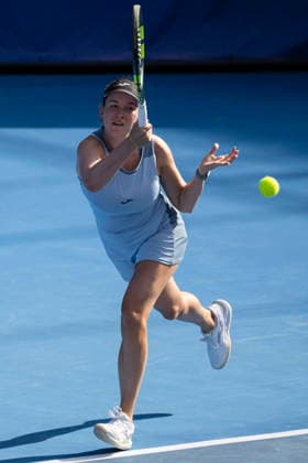Dominika Salkova of Czech Republic returns a ball to Antonia Ruzic of Croatia during the women s WTA, Tennis Damen 250 Livesport Prague Open 2026 tennis tournament match, on July 20, 2026, in Prague, Czech Republic. (CTKxPhoto MichalxKamaryt) CTKPhotoP2026072006481  CTKPhotoP2026072006481