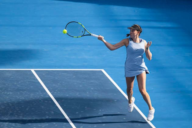 Dominika Salkova of Czech Republic returns a ball to Antonia Ruzic of Croatia during the women s WTA, Tennis Damen 250 Livesport Prague Open 2026 tennis tournament match, on July 20, 2026, in Prague, Czech Republic. (CTKxPhoto MichalxKamaryt) CTKPhotoP2026072006517  CTKPhotoP2026072006517