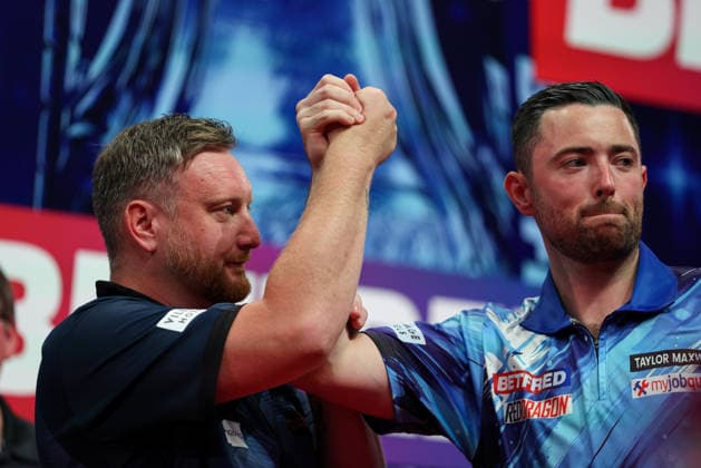 RECORD DATE NOT STATED 20th July 2026, Winter Gardens, Blackpool, Lancashire, England; 2026 Betfred World Matchplay Darts, Day Three; Luke Humphries holding Cameron Menzies hand up AidanxHunter