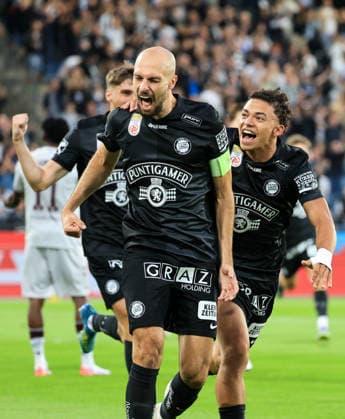 SOCCER - UEFA CL, Sturm vs Hearts GRAZ,AUSTRIA,21.JUL.26 - SOCCER - UEFA Champions League, qualification, SK Sturm Graz vs Heart of Midlothian FC. Image shows the rejoicing of Jon Gorenc-Stankovic, Jacob Peter Hoedl and Szymon Wlodarczyk (Sturm).  GEPAxpictures xWolfgangxGrebien