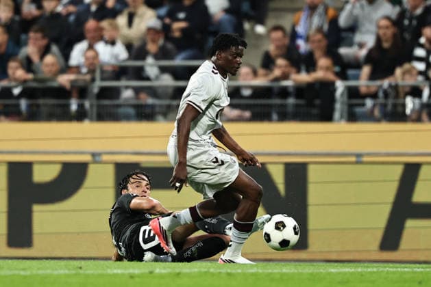 SOCCER - UEFA CL, Sturm vs Hearts GRAZ,AUSTRIA,21.JUL.26 - SOCCER - UEFA Champions League, qualification, SK Sturm Graz vs Heart of Midlothian FC. Image shows Albert Vallci (Sturm) and Pierre Landry Kabore (Hearts).  GEPAxpictures xChrisxBauer