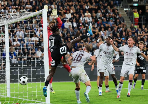 SOCCER - UEFA CL, Sturm vs Hearts GRAZ,AUSTRIA,21.JUL.26 - SOCCER - UEFA Champions League, qualification, SK Sturm Graz vs Heart of Midlothian FC. Image shows Alexander Schwolow (Hearts), Seedy Jatta (Sturm) and Harry Milne (Hearts).  GEPAxpictures xWolfgangxGrebien