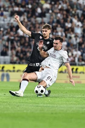SOCCER - UEFA CL, Sturm vs Hearts GRAZ,AUSTRIA,21.JUL.26 - SOCCER - UEFA Champions League, qualification, SK Sturm Graz vs Heart of Midlothian FC. Image shows Szymon Wlodarczyk (Sturm) and Oisin McEntee (Hearts).  GEPAxpictures xChrisxBauer