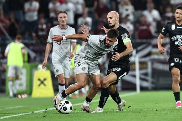 SOCCER - UEFA CL, Sturm vs Hearts GRAZ,AUSTRIA,21.JUL.26 - SOCCER - UEFA Champions League, qualification, SK Sturm Graz vs Heart of Midlothian FC. Image shows Claudio Braga (Hearts) and Jon Gorenc Stankovic (Sturm).  GEPAxpictures xChrisxBauer