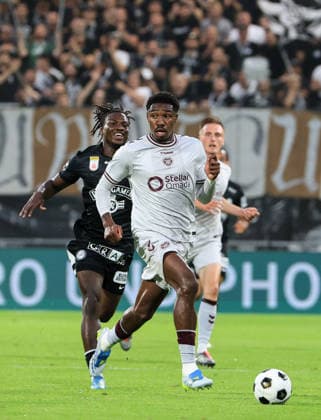 SOCCER - UEFA CL, Sturm vs Hearts GRAZ,AUSTRIA,21.JUL.26 - SOCCER - UEFA Champions League, qualification, SK Sturm Graz vs Heart of Midlothian FC. Image shows Blair Spittal (Hearts) and Seedy Jatta (Sturm).  GEPAxpictures xWolfgangxGrebien